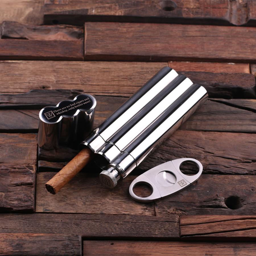 Custom Stainless Steel Cigar Holder Whiskey Flask & Cutters - laying on wood background with top off of holder and cigar cutter laying next to it