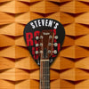 Custom Ultimate Guitarist Wall Mount Guitar Holder - rock and roll design - on wood background with guitar hanging.