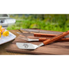 Grill Boss Superfan Grill Set - broncos logo and lettering on outdoor table showing tongs, fork and spatula