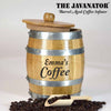 Javanator® Barrel Aged Coffee Infuser barrel with coffee beans in front showing the barrel with the personalization of &#39;Emma&#39;